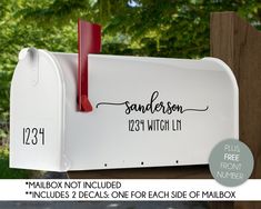 a white mailbox with the words sandleson and 1231 which ly on it