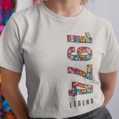 You've found the perfect 50th Birthday Gift for Mom, Wife, Sister or Friend. This 1974 Legend t-shirt features a great groovy flower pattern that she will surely love. If you are looking for something else just go to our Etsy shop and look at all our great designs. Whether you're looking for something for your wife, mother, sister, or just a female friend you've found it. It's made of 100% ring-spun cotton and is soft and comfy. The double stitching on the neckline and sleeves adds more durabili Retro White Tops For Anniversary, Hello 50, 1974 Birthday, 50th Birthday Gifts For Woman, 50th Birthday Decorations, 50th Birthday Shirts, Old Shirts, 50th Birthday Gifts, Female Friends