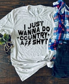 I Just Wanna Do Country Ass Shit Bella + Canvas Unisex Shirt by Boots and Roots Apparel. Embrace your inner country spirit with our "I Just Wanna Do Country Ass Shit" shirt from Boots and Roots Apparel! 🤠🌾 Made with the finest materials and crafted with care in Texas, this Bella + Canvas shirt is as comfortable as it is stylish. Whether you're hitting the backroads, wrangling cattle, or simply enjoying the rural life, this shirt is perfect for those who crave the simple joys of country living. Casual White Tops For Country Events, Country Style White Graphic T-shirt, White Cotton Top For Country Events, White Cotton Tops For Country Events, Casual White T-shirt For Country Concerts, Country Style White Cotton T-shirt, Lake Girl, Cute Country Outfits, Simple Joys