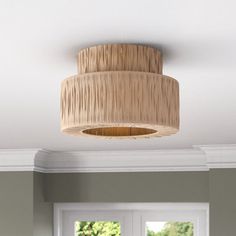 a light fixture hanging from the ceiling in a living room