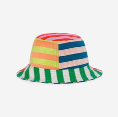 Knit bucket hat with colorblock stripe patchwork. Made from colorful, soft hypoallergic yarn. From sunny summer beach days to cold winter walks, this bucket hat is destined for year-round wear. Each hat is one of a kind – patchwork pattern placement may vary, but that's the fun of it! Fully lined. Details Body: 100% Acrylic Lining: 100% Deadstock poly-cotton fabric Machine wash gentle, lay flat to reshape and dry8.5"w, 3.5"h, 2.25" brim, 22" interior circumference Playful Multicolor Sun Hat For Spring, Playful Multicolor Cotton Sun Hat, Multicolor Bucket Hat For The Beach, Multicolor Bucket Hat For Beach, Playful Multicolor Cotton Hats, Playful Green Brimmed Bucket Hat, Retro Multicolor Bucket Sun Hat, Playful Multicolor Sun Hat For Outdoor, Multicolor Curved Brim Bucket Hat For Spring