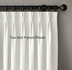 the words two fold french pleats are written in black on a white curtain rod