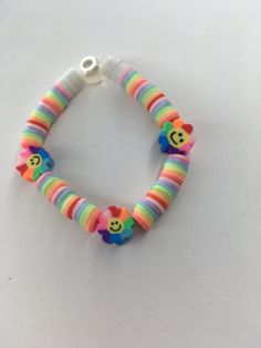 Cute rainbow waterfall bracelet, perfect for anything and comes with : Jewelry bag, sticker, and product:) Trendy Beaded Rainbow Friendship Bracelets, Trendy Rainbow Friendship Bracelets With Round Beads, Trendy Rainbow Friendship Bracelets With Letter Beads, Trendy Rainbow Friendship Bracelet With Round Beads, Rainbow Plastic Jewelry With Colorful Beads, Rainbow Colorful Beads Plastic Jewelry, Fun Rainbow Friendship Bracelets As Gift, Adjustable Rainbow Beaded Bracelets Playful Style, Fun Rainbow Friendship Bracelets As Gifts