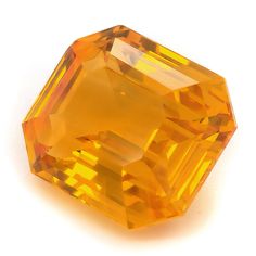 an orange diamond on a white background