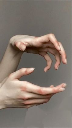 two hands reaching out towards each other