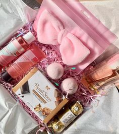 a pink hamper filled with lots of beauty products