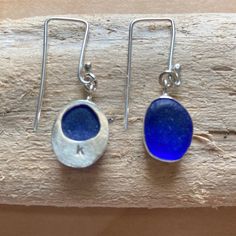 Sterling Silver Cobalt Blue Dangly Sea Glass Earrings For a made to order you would choose your sea glass or supply me with your own sea glass that will be made into a *similar* set of earrings. Please message me with any questions! They arrive in Navy jewel box with ribbon. Each item is unique and custom made to order. RETURNS & EXCHANGES I gladly accept returns and exchanges Contact me within: 14 days of delivery Ship items back within: 30 days of delivery I don't accept cancellations But Nickel-free Silver Earrings With Recycled Glass, Nickel-free Silver Earrings In Recycled Glass, Blue Sea Glass Nickel Free Earrings, Blue Sea Glass Nickel-free Earrings, Nickel-free Blue Sea Glass Earrings, Blue Teardrop Sea Glass Earrings, Blue Sea Glass Dangle Jewelry, Handmade Blue Sea Glass Earrings, Handmade Silver Sea Glass Earrings