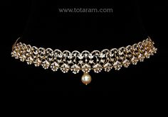 18 karat gold 'detachable - 5 in 1' diamond choker necklace with color stones & south sea pearls
    this product has a detachable pendant which can be used as a separate pendant with most chains.
  this product has inter changeable stones in the necklace and pendant.
   length of the pendant : 2.60 inches
  width of the pendant : 1.40 inches  

introducing our exquisite 18 karat gold 'detachable - 5 in 1' diamond choker necklace, a stunning piece of jewelry handcrafted with precision and care i Gold Diamond Choker For Wedding, Gold Diamond Wedding Choker, Elegant 22k Gold Choker For Wedding, Elegant 22k Gold Wedding Choker, Luxury Diamond Choker For Wedding, Elegant 22k Gold Choker, Detachable Pendant, Diamond Choker Necklace, Diamond Choker