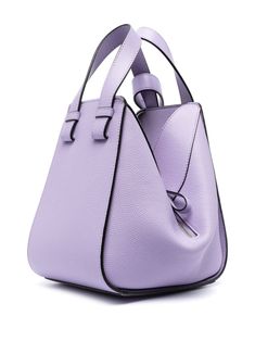 Compact Hammock grained leather tote bag from LOEWE featuring lilac purple, calf leather, grained texture, signature embossed Anagram motif, hook and eye fastening, adjustable detachable shoulder strap, two top handles, main compartment and internal slip This item is in size UNI and the color is Violet Modern Pebbled Leather Shoulder Bag With Handles, Purple Leather Shoulder Bag With Detachable Handle, Modern Purple Bag With Detachable Strap, Modern Purple Top Handle Shoulder Bag, Purple Leather Satchel With Top Carry Handle, Purple Leather Shoulder Bag With Top Carry Handle, Purple Leather Bag With Detachable Handle, Modern Purple Leather Shoulder Bag, Modern Purple Leather Satchel