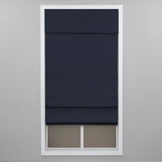 an empty window with a blue blind in it