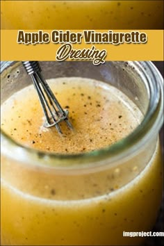 an apple cider vinaigrete dressing in a mason jar