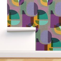 an abstract wallpaper with colorful shapes on it