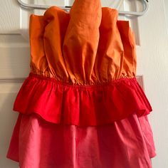 Do+Be Colorful Ruffle Sleeveless Top; Never Worn; Still Has Tags Strapless Ruffled Tops For Day Out, Pink Ruffle Hem Top For Summer, Pink Ruffle Hem Top For Vacation, Strapless Ruffle Top For Vacation, Pink Top With Ruffled Straps For Day Out, Strapless Ruffled Tops For Vacation, Beach Pink Top With Ruffle Hem, Summer Orange Top With Ruffles, Multicolor Sleeveless Top With Ruffles