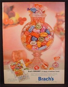 an advertisement for a gummy candy machine with lots of candies in the bowl