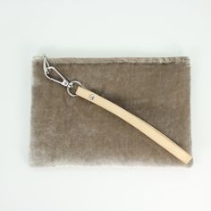 Solid colored silk velvet in the perfect wallet size, with an added detachable leather wristlet strap. Measures 7.5" x 5", Silk Velvet, Spot Clean. Handmade in Portland, Oregon. Elegant Beige Clutch With Wrist Strap, Beige Clutch With Wrist Strap As Gift, Beige Clutch With Wrist Strap For Gift, Evening Rectangular Wristlet With Wrist Strap, Modern Clutch With Wrist Strap, Modern Wristlet Clutch With Wrist Strap, Everyday Clutch Wristlet With Detachable Strap, Beige Rectangular Wristlet With Wrist Strap, Beige Rectangular Clutch With Wrist Strap