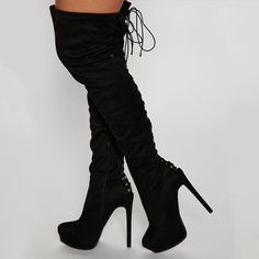 Step up your style with these black platform lace-up thigh-high boots. Featuring a lace-up design, platform sole, and thigh-high length, these boots are perfect for making a bold fashion statement. Color: Black Heel Type: Stiletto heel Heel height: 5.9" / 150 mm approx Product measurements were taken using size 8. Please note that measurements may vary by size. Toe: Almond toe Back hollow-out and lace-up design Handcrafted US sizing. Fits true to size. Party Platform Knee-high Lace-up Boots, Party Knee-high Lace-up Platform Boots, Black Lace-up Platform Knee-high Boots, Black Lace-up Knee-high Platform Boots, Edgy Lace-up Boots For Club, Black Lace-up Boots For Party, Edgy Lace-up Club Boots, Knee-high Platform Heeled Boots For Club, Platform Knee-high Heeled Boots For Club