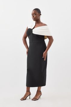 Experience Opulence In Our Plus Size Midi Dress, With A Fitted Silhouette, And An Asymmetric Strap Design, With One That Sits Off The Shoulder And One On The Shoulder. Style It With Strappy Heels For An Occasion Look That Will Take You From Wedding Guest Days To Party Nights. Plus Size Figure Form Bandage Knit Asymmetric Strap Midi Dress High Quality, Soft Knit Fabric Flattering Figure Hugging Fit Unique, Asymmetric Strap Detailing Thigh High Leg Split In Back Zip Fastening In Back Expertly Desi Dress Leather Boots, Outfits Petite, Christmas Day Outfit, Petite Coat, Fall Outfits For Work, Corset Style, Plus Size Wedding, Karen Millen, Bandage Dress