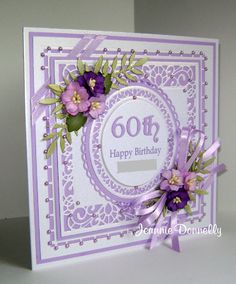 a birthday card with purple flowers on it