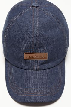 Baseball cap is crafted from denim and detailed with an Acne Studios logo patch on the front. Complete with an adjustable closure at the back. FN-UX-HATS000208 Denim Snapback Baseball Cap For Streetwear, Adjustable Denim Hat With Curved Visor, Casual Baseball Cap With Leather Patch, Denim Blue Baseball Cap, Casual Denim Baseball Cap With Curved Visor, Denim Hat With Curved Bill, Adjustable Denim Hat With Embroidered Logo, Trucker Style Baseball Cap With Logo Patch, Trucker Baseball Cap With Logo Patch