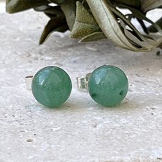 * Beautiful natural Aventurine stud earrings  * Sterling silver components * Stones approx 8mm * One pair with butterfly backs One pair of lovely green Aventurine  stud earrings totally handmade in my Hertfordshire UK workshop. Can be sent with a handmade gift card and comes in a hand made gift bag ready to give as a present! Send direct if you have forgotten a birthday or are in a hurry! Please see  my other gemstone jewellery in my Etsy shop: RedDollyDesigns.Etsy.com Thanks Julia Aventurine Natural Stone Earrings Gift, Aventurine Natural Stone Earrings, Eileen Kelly, Beautiful Stones, Gemstone Jewellery, Green Gemstones, Delicate Earrings, Earrings Sterling Silver, Green Aventurine