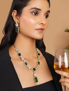 The  moissanite polki necklace is an exquisite piece of jewellery that draws inspiration from the rich Indian heritage. It features green semi precious stones which are like cabochon emeralds. Each stone is carefully handpicked to exude a regal and majestic aura. These stunning green stones are set in a way that highlights their natural beauty and enhances their radiance. The matching earrings are designed to complement the necklace and complete the overall look. The green and white semi preciou Polki Necklace Set, Polki Necklace, Green Stones, Polki Jewellery, Indian Heritage, Silver Jewelry Fashion, Wedding Jewellery, Wedding Jewellery Necklace, Semi Precious Stones