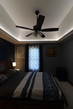 Bedroom with a recessed ceiling that is illuminated by white LED strip lights Bedroom Cove Lighting, Lighting Diy, Led Strip Light