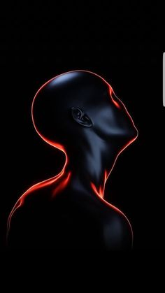 an alien is shown in the dark with red light coming from its head and back