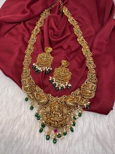 Matte Goddess lakshmi Long Haar Necklace in Antique Finish. Real look alike gold. Pair it up Silk saree or lehenga Necklace Length : 24 Inches; comes with adjustable back chain. Earring Length : 2.25 Inches Approx. Push Back  Ready to ship from Boston, Massachusetts. If you have any questions let me know. Thank you!! Gold Cutdana Sets For Puja, Gold Traditional Wear With Tilla Embroidery, Gold Tilla Lehenga For Diwali, Gold Bridal Necklace With Zari Work For Diwali, Heavy Gold Traditional Wear For Navratri, Heavy Gold Sets For Festive Occasions, Gold Bollywood Sets For Diwali, Bollywood Style Gold Sets For Diwali, Gold Traditional Wear With Meenakari For Celebration