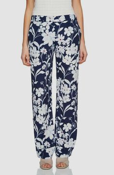 $140 1.State Women's Navy Blue High Rise Floral Print Casual Pants Size 2 Description High rise. True to size. DETAILS & CARE Wearing a print on your bottom half is a bold move, but these pants make it easy with their drapey fabric and fluid fit. 31" inseam; 19" leg opening; 11" front rise; 17" back rise (size 8) Zip fly with button closure Side-seam pockets; back patch pockets 100% rayon Machine wash, line dry Imported About Us We sell only 100% authentic clothing from new with tags to gently u Spring Mid-rise Bottoms For Daywear, Mid-rise Bottoms For Spring Daywear, Spring Season Mid-rise Bottoms For Daywear, Stretch Floral Print Bottoms For Daywear, Blue Floral Print Bottoms For Workwear, Print Pants, Printed Pants, Navy Women, Casual Pants