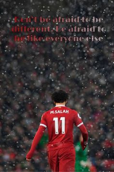 a soccer player in the rain with a quote