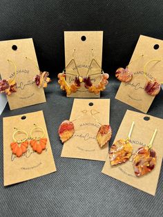 Free Shipping to US addresses Lightweight fall color clay earrings, pumpkin shaped clay with shiny resin coating On a gold coated ear wire hoop; Hoop diameter is 1.25 inches Orange, red burgundy maroon and gold clay earrings Autumn pumpkin handmade earrings unique Halloween Thanksgiving gift for her  All my earrings are handmade and slight variations in color or texture may occur Handmade Jewelry For Fall, Hypoallergenic Brown Hoop Earrings As Gift, Brown Jewelry Gift For Fall, Brown Jewelry For Fall Season Gift, Brown Jewelry For Fall Gifts, Nickel Free Polymer Clay Hoop Earrings As Gift, Unique Red Jewelry For Everyday, Unique Red Jewelry For Everyday Wear, Everyday Hypoallergenic Orange Jewelry