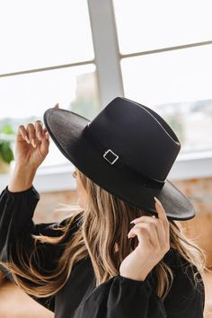 We love a good hat, and our new Tandee Wide Brim Panama Hat does not disappoint! Available in a variety of colors our hat has a wide brim and comfortable shape for the crown, making it a pretty good fit for everyone! It features a fun swede strap with a tassel and an easy buckle that you can slide on and off. Rock it with your favorite sweaters and booties all season long! Fabric: 65% Cotton, 35% Polyester Adjustable band on the inside for the perfect fit Chic Adjustable Fedora With Flat Crown, Chic Adjustable Hat With Flat Crown, Trendy Adjustable Fedora With Flat Crown, Chic Adjustable Felt Hat With Short Brim, Wide Brim Hat With Adjustable Strap For Spring, Chic Adjustable Wide Brim Felt Hat, Adjustable Sun Hat With Flat Crown, Trendy Adjustable Wide Brim Hat, Trendy Wide Brim Adjustable Hat