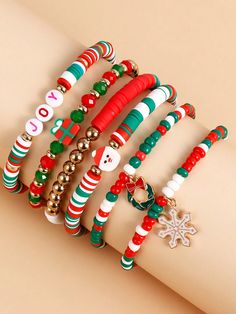 the bracelets are decorated with christmas decorations