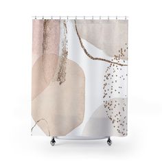 a shower curtain with an abstract design on the front and back of it, featuring gold dots