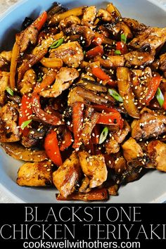 a plate with chicken, peppers and sesame seeds on it next to the words blackstone chicken teriyaki