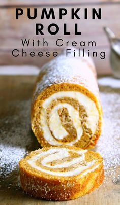 pumpkin roll with cream cheese filling on a cutting board