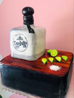 a cake made to look like a bottle of tequila