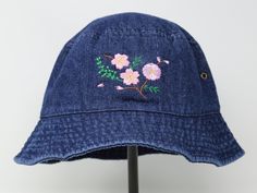 Item: Sakura embroidered bucket hat Material: 100% cotton Size: one size fits most Embroidery: machine embroidered Customization is open, please let me know if you want the design on a different color hat. Free first class shipping, upgradable priority mail service. 30 days return policy, feel confident at your purchase! Spring Hat With Embroidered Logo And Short Brim, Adjustable Bucket Hat With Embroidered Logo And Short Brim, Adjustable Embroidered Cotton Sun Hat, Spring Wide Brim Bucket Hat With Embroidered Logo, Embroidered Brimmed Bucket Hat For Spring, Embroidered Adjustable Sun Cap, Adjustable Embroidered 5-panel Hat, Spring Embroidered Wide Brim Bucket Hat, Embroidered Adjustable 5-panel Hat