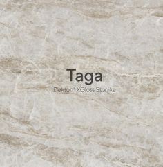 the words taga written in black and white on a beige marble background with text below