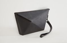 Our hight end goat leather clutch has one big compartment and zipper pocket inside. —Goat leather —Nickel free hardware Modern Evening Bag, Sleek Leather Rectangular Clutch, Geometric Leather Evening Bag, Sleek Rectangular Leather Clutch, Modern Formal Evening Bag With Removable Pouch, Modern Structured Clutch For Formal Occasions, Modern Evening Bag With Removable Pouch, Modern Clutch With Magnetic Closure, Modern Formal Evening Bag