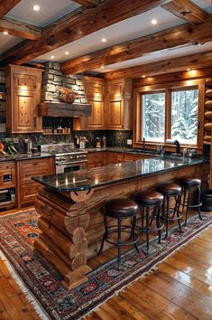 a large kitchen with wooden cabinets and black counter tops, along with an island in the middle