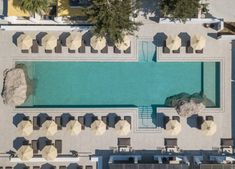 an aerial view of the pool and lounge chairs