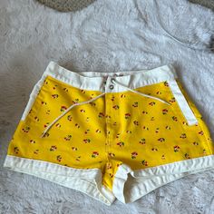 Very Cute Summary Shorts With White Back Pockets, So Refreshing To The Eyes Yellow High-waisted Bottoms With Built-in Shorts, High Waist Yellow Beachwear Bottoms, Fitted Cotton Shorts From Urban Outfitters, Fitted Cotton Shorts By Urban Outfitters, Trendy Yellow Shorts With Pockets, Urban Outfitters Fitted Cotton Shorts, High Waist Yellow Shorts For Beach, Trendy Yellow Shorts For Beach Season, Trendy Yellow Cotton Shorts