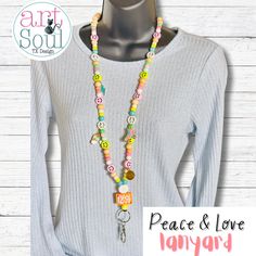 A unique and fun way to show off how groovy you are with this colorful retro peace and love lanyard. Product Details: ❤️ Available Size: Standard: 19 inchesLong: 23 inches ❤️ Handmade: Nylon String, Beads, Silicone Bead, Plastic Beads, and Breakaway Clasp Adjustable Playful Beaded Necklaces For Festivals, Adjustable Playful Beaded Necklace For Festival, Fun Multicolor Lanyards As Gifts, Fun Multicolor Lanyards For Gifts, Trendy Multicolor Lanyards For Gifts, Trendy Multicolor Lanyards As Gifts, Adjustable Multicolor Bohemian Lanyards, White Adjustable Fun Lanyards, Casual Adjustable Multicolor Lanyards