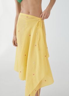 Sarong skirt with embroidered details - Woman | MANGO USA Pareo Skirt, Sarong Skirt, Formal Jumpsuit, Plus Size Formal, Pastel Yellow, Asymmetrical Design, Accessories Jacket, Swimwear Collection, Women Skirts Midi