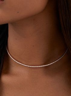 Elevate your elegance with this stunning luxury diamond tennis necklace. Crafted in 14K/18K white gold, it features 3.50 carats or 6 carats of shimmering, lab-grown diamonds, arranged in a timeless choker design. Perfect as a statement piece or for layering, this necklace is ideal for special occasions or an anniversary present for her. Experience sustainable luxury with unmatched sparkle. Indulge in brilliance with Evara Jewelry’s finest. 𝐅𝐞𝐚𝐭𝐮𝐫𝐞𝐬:• 𝐌𝐚𝐝𝐞 𝐭𝐨 𝐎𝐫𝐝𝐞𝐫• 𝐌𝐞𝐭𝐚𝐥: Diamond Tennis Necklace White Gold, Timeless Diamond White Tennis Necklace As Gift, Minimalist White Gold Diamond Tennis Necklace, Dazzling Lab Grown Diamond Necklaces, Cubic Zirconia Diamond Necklace For Everyday Luxury, Timeless Diamond Cut Tennis Necklace As A Gift, Timeless Tennis Necklace With Diamond Cut As Gift, Luxury Diamond Solitaire Necklace With Sparkling Stones, Timeless Tennis Necklace With Diamond Cut For Gift