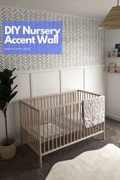 a nursery room with a crib, rug and potted plant