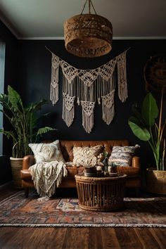 a living room filled with furniture and plants