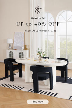 a white table with black chairs in front of it and the words up to 40 % off