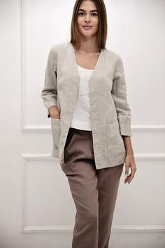 100% LINEN JACKET This linen jacket has a relaxed texture and a beautiful drape. Each item is washed after being hand-sewn to add an effect of softness & comfort.Jacket is not transparent.C O L O U R Beige Melange.This jacket looks awesome in all our colours.C O M P O S I T I O N• 100% pure & soft linen | fabric weight 185 gS I Z E  G U I D E The model is wearing size S Model height : 173Length ± 75 cm /30" (depending on size)----------34---36---38---40---42----44----46-----48--------- X Linen Blazer Outfit Women, Linen Coats Women, Linen Jackets Women, Summer Coat, Linen Coat, Summer Coats, Linen Jackets, Linen Jacket, Jacket For Women